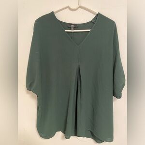 Woman’s cold shoulder size S in Plus size.  Never worn beautiful blouse